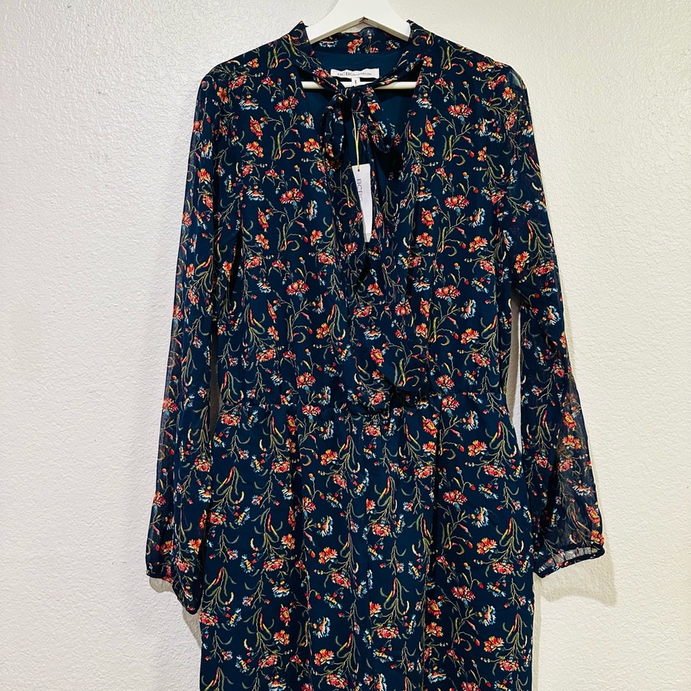 BCBG generation Navy Blue with Floral Romper new with tags